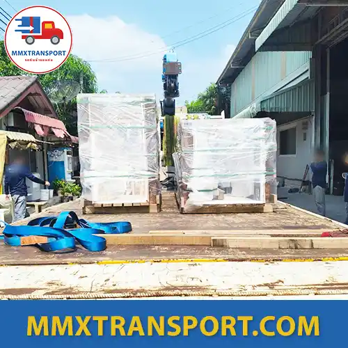 การขนย้ายเครื่องจักรโรงงานด้วยรถเครนและรถบรรทุก